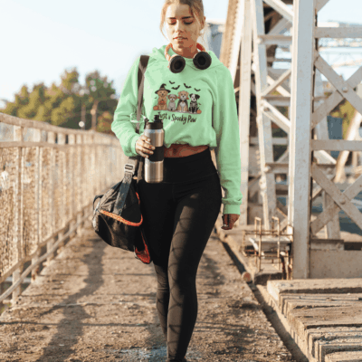 crop top hoodie mockup featuring a woman walking to the gym 46192 r el2 - teedoges